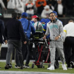 
              Miami Dolphins head coach Mike McDaniel walks away as quarterback Tua Tagovailoa is taken off the field on a stretcher during the first half of an NFL football game against the Cincinnati Bengals, Thursday, Sept. 29, 2022, in Cincinnati. (AP Photo/Joshua A. Bickel)
            