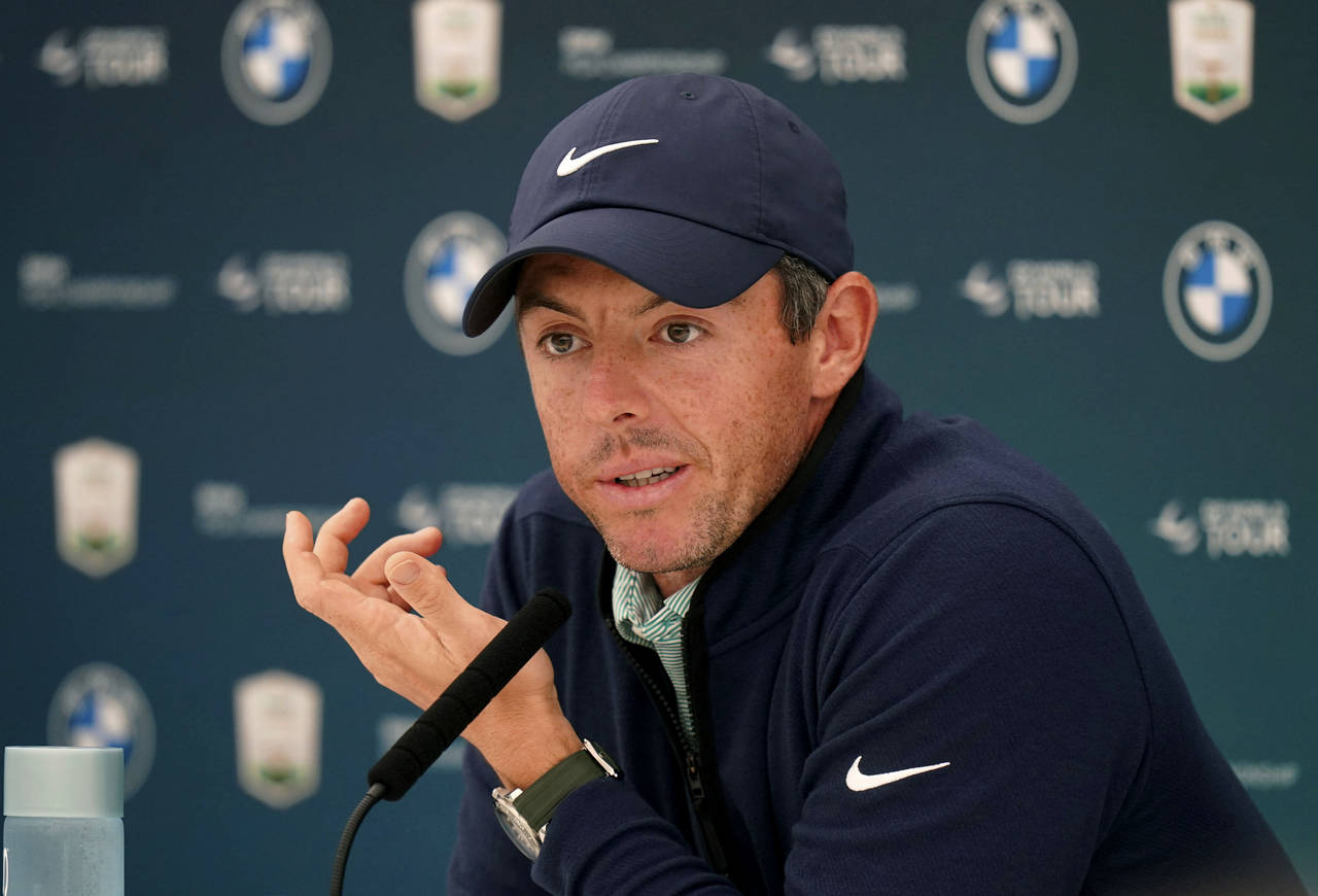 Golfer Rory McIlroy speaks at a press conference during the Pro-Am ahead of the BMW PGA Championshi...