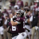 
              Texas A&M quarterback Haynes King (13) throws a pass against Sam Houston State during the first half of an NCAA college football game Saturday, Sept. 3, 2022, in College Station, Texas. (AP Photo/David J. Phillip)
            