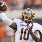 
              Central Michigan quarterback Daniel Richardson throws a pass during the first half of an NCAA college football game against Oklahoma State, Thursday, Sept. 1, 2022, in Stillwater, Okla. (AP Photo/Sue Ogrocki)
            