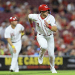 
              Cincinnati Reds' Spencer Steer scores a run on a walkoff hit by Jonathan India during the ninth inning of a baseball game against the Colorado Rockies in Cincinnati, Friday, Sept. 2, 2022. (AP Photo/Aaron Doster)
            