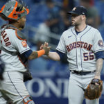 
              Houston Astros relief pitcher Ryan Pressly (55) and catcher Martin Maldonado celebrate after the team defeat the Tampa Bay Rays during a baseball game Tuesday, Sept. 20, 2022, in St. Petersburg, Fla. (AP Photo/Chris O'Meara)
            
