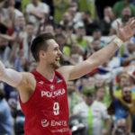 
              Poland's Mateusz Ponitka celebrates after the Eurobasket quarter final basketball match between Slovenia and Poland in Berlin, Germany, Wednesday, Sept. 14, 2022. Poland defeated Slovenia by 90-87. (AP Photo/Michael Sohn)
            