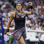 
              Caroline Garcia, of France, celebrates after winning a point against Coco Gauff, of the United States, during the quarterfinals of the U.S. Open tennis championships, Tuesday, Sept. 6, 2022, in New York. (AP Photo/Charles Krupa)
            