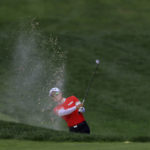
              Minjee Lee, of Australia, plays a shot out of a bunker on the fourth fairway during the second round of the LPGA Tour Kroger Queen City Championship golf tournament in Cincinnati, Friday, Sept. 9, 2022. (AP Photo/Aaron Doster)
            