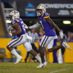 
              LSU running back Noah Cain (21) carries for a touchdown in the second half of an NCAA college football game against New Mexico in Baton Rouge, La., Saturday, Sept. 24, 2022. LSU won 38-0. (AP Photo/Gerald Herbert)
            