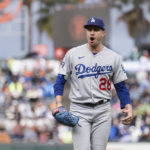 
              Los Angeles Dodgers pitcher Andrew Heaney reacts after ending the inning with San Francisco Giants runners on second and third base during the fourth inning of a baseball game in San Francisco, Sunday Sept. 18, 2022. (AP Photo/John Hefti)
            