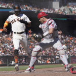 
              Philadelphia Phillies catcher J.T. Realmuto, right, forces San Francisco Giants' Lewis Brinson out at home during the sixth inning of a baseball game in San Francisco, Saturday, Sept. 3, 2022. (AP Photo/Jeff Chiu)
            