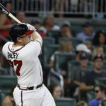 
              Atlanta Braves' Austin Riley hits a solo home run in the fourth inning of a baseball game against the Miami Marlins on Saturday, Sept. 3, 2022, in Atlanta. (AP Photo/Bob Andres)
            