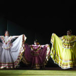 
              Local folklorico dancers perform during Hispanic Heritage Weekend at Chase Field prior to a baseball game between the Arizona Diamondbacks and the San Diego Padres in Phoenix, Saturday, Sept. 17, 2022. (AP Photo/Ross D. Franklin)
            