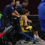 
              Australia's Bec Allen is taken from the arena by medical staff after an injury during their game at the women's Basketball World Cup against Serbia in Sydney, Australia, Sunday, Sept. 25, 2022. (AP Photo/Mark Baker)
            