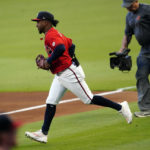
              Atlanta Braves second baseman Ozzie Albies (1) takes the field for the team's baseball game against the Philadelphia Phillies on Friday, Sept. 16, 2022, in Atlanta. Albies played in his first game since returning from a foot injury. (AP Photo/John Bazemore)
            