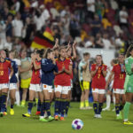 
              FILE - Spain players applaud the fans at the end of a Women Euro 2022 group B soccer match against German on July 12, 2022, in London. Germany won 2-0. Fifteen players are expected to quit Spain's national team after their demand for a coaching change was rejected by the Spanish federation on Thursday, Sept. 22. The federation said it received identical emails from the 15 players saying they would renounce their places on the team if coach Jorge Vilda wasn’t fired. (AP Photo/Alessandra Tarantino, File)
            