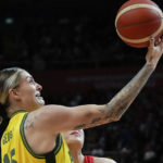 
              Australia's Cayla George lays up for a shot at goal during their semifinal game against China at the women's Basketball World Cup in Sydney, Australia, Friday, Sept. 30, 2022. (AP Photo/Mark Baker)
            