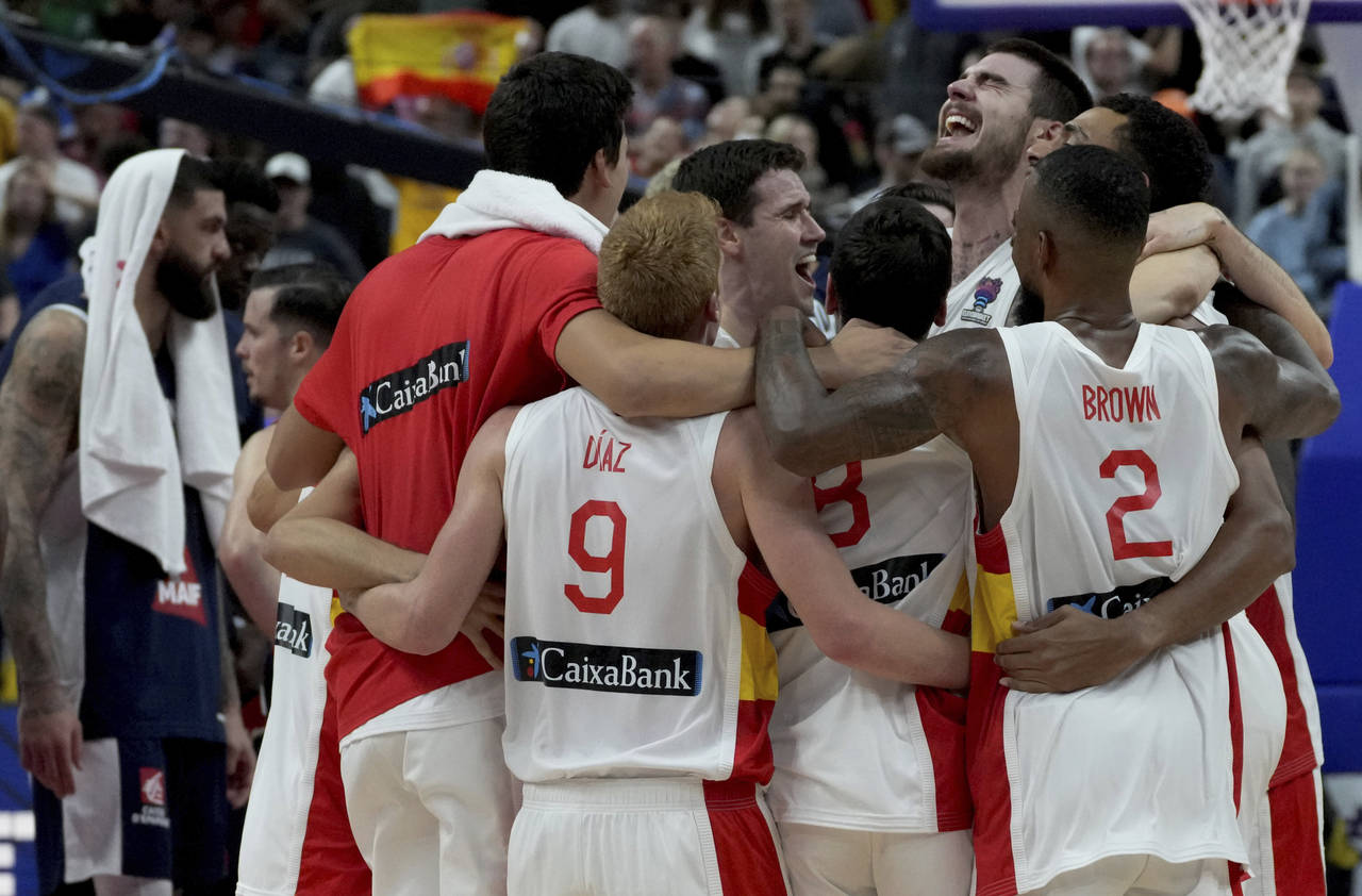 The players of team Spain celebrate winning the Eurobasket final basketball match between Spain and...