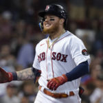 
              Boston Red Sox's Alex Verdugo celebrates after his home run as he makes his way to the dugout in the sixth inning of a baseball game against the Texas Rangers, Thursday, Sept. 1, 2022, in Boston. (AP Photo/Steven Senne)
            