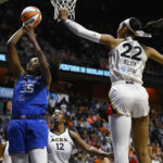 
              Connecticut Sun's Jonquel Jones shoots as Las Vegas Aces' A'ja Wilson, right, defends during the first half in Game 3 of basketball's WNBA Finals, Thursday, Sept. 15, 2022, in Uncasville, Conn. (AP Photo/Jessica Hill)
            