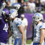 
              Detroit Lions place kicker Austin Seibert, right, reacts in front of Minnesota Vikings safety Josh Metellus (44) after missing a field goal during the second half of an NFL football game, Sunday, Sept. 25, 2022, in Minneapolis. The Vikings won 28-24. (AP Photo/Andy Clayton-King)
            