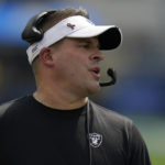
              Las Vegas Raiders head coach Josh McDaniels watches from the sideline during the first half of his team's NFL football game against the Los Angeles Chargers in Inglewood, Calif., Sunday, Sept. 11, 2022. (AP Photo/Gregory Bull)
            