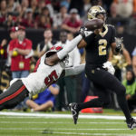 
              Tampa Bay Buccaneers linebacker Shaquil Barrett strips the ball form New Orleans Saints quarterback Jameis Winston during the first half of an NFL football game in New Orleans, Sunday, Sept. 18, 2022. The Saints recovered the ball. (AP Photo/Gerald Herbert)
            
