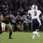 
              Purdue wide receiver Charlie Jones (15) catches a pass during the team's NCAA college football game against Florida Atlantic, Saturday, Sept. 24, 2022, in West Lafayette, Ind. (Alex Martin/Journal & Courier via AP)
            