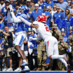 
              Kentucky wide receiver Chris Lewis (89) catches a pass in the end zone for a touchdown while being guarded by Youngstown State defensive back Troy Jakubec (2) during the first half of an NCAA college football game in Lexington, Ky., Saturday, Sept. 17, 2022. (AP Photo/Michael Clubb)
            