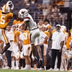 
              Tennessee defensive back Kamal Hadden (5) intercepts a pass intended for Ball State wide receiver Yo'Heinz Tyler during the first half of an NCAA college football game Thursday, Sept. 1, 2022, in Knoxville, Tenn. (AP Photo/Wade Payne)
            