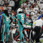 
              Miami Dolphins quarterback Tua Tagovailoa is taken off the field on a stretcher during the first half of an NFL football game against the Cincinnati Bengals, Thursday, Sept. 29, 2022, in Cincinnati. (AP Photo/Jeff Dean)
            