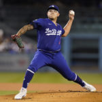
              Los Angeles Dodgers starting pitcher Julio Urias (7) throws during the first inning of a baseball game against the Arizona Diamondbacks in Los Angeles, Thursday, Sept. 22, 2022. (AP Photo/Ashley Landis)
            