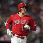 
              Los Angeles Angels designated hitter Shohei Ohtani (17) runs to first while flying out to right field during the sixth inning of a baseball game against the Detroit Tigers in Anaheim, Calif., Tuesday, Sept. 6, 2022. (AP Photo/Ashley Landis)
            