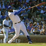 
              Chicago Cubs' Franmil Reyes (32) hits a one run single against the Cincinnati Reds during the sixth inning of a baseball game, Thursday, Sept. 8, 2022, in Chicago. (AP Photo/David Banks)
            