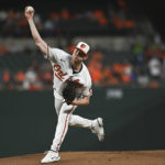 
              Baltimore Orioles starting pitcher Kyle Bradish throws to a Houston Astros batter during the first inning of a baseball game Thursday, Sept. 22, 2022, in Baltimore. (AP Photo/Tommy Gilligan)
            