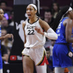 
              Las Vegas Aces' A'ja Wilson  (22) reacts after she was fouled during the first half in Game 4 of a WNBA basketball final playoff series against the Connecticut Sun, Sunday, Sept. 18, 2022, in Uncasville, Conn. (AP Photo/Jessica Hill)
            
