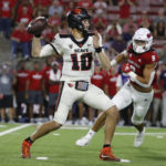 
              Oregon State's Chance Nolan gets ready to throw a pass as Fresno State linebacker Levelle Bailey pursues during the first half of an NCAA college football game in Fresno, Calif., Saturday, Sept. 10, 2022. (AP Photo/Gary Kazanjian)
            