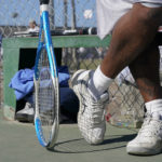 
              James Duff, an inmate at San Quentin State Prison, watches his teammates play against visiting tennis players in San Quentin, Calif., Saturday, Aug. 13, 2022. (AP Photo/Godofredo A. Vásquez)
            
