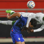 
              United States' Gio Reyna, bottom, duels for the ball with Saudi Arabia's Saud Abdullah Abdulhamid during the international friendly soccer match between Saudi Arabia and United States in Murcia, Spain, Tuesday, Sept. 27, 2022. (AP Photo/Jose Breton)
            