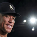 
              New York Yankees' Aaron Judge smiles as he speaks during an interview after the team's baseball game against the Toronto Blue Jays, in which he hit his 61st home run of the season, Wednesday, Sept. 28, 2022, in Toronto. (Nathan Denette/The Canadian Press via AP)
            