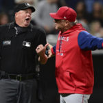 
              Los Angeles Angels interim manager Phil Nevin, right, argues with home plate umpire Ron Kulpa after being ejected during the seventh inning of a baseball game against the Cleveland Guardians, Monday, Sept. 12, 2022, in Cleveland. The Guardians won 5-4. (AP Photo/David Dermer)
            