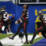 
              Atlanta Falcons cornerback Darren Hall, center, reacts after recovering a fumble during the second half of an NFL football game against the Los Angeles Rams, Sunday, Sept. 18, 2022, in Inglewood, Calif. (AP Photo/Ashley Landis)
            