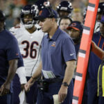 
              Chicago Bears head coach Matt Eberflus, center, watches from the sideline during the first half of an NFL football game against the Green Bay Packers Sunday, Sept. 18, 2022, in Green Bay, Wis. (AP Photo/Mike Roemer)
            