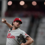 
              Philadelphia Phillies starting pitcher Aaron Nola delivers in the third inning of a baseball game against the Atlanta Braves, Saturday, Sept. 17, 2022, in Atlanta. (AP Photo/Brynn Anderson)
            