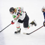 
              Regina Metzler of Hungary in action with Lacey Eden of USA, right, during The IIHF World Championship Woman's ice hockey match between USA and Hungary in Herning, Denmark, Thursday, Sept. 1, 2022. (Bo Amstrup/Ritzau Scanpix via AP)
            