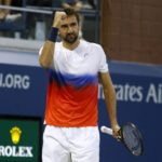 
              Marin Cilic, of Croatia, celebrates winning a point against Daniel Evans, of the United Kingdom, during the third round of the U.S. Open tennis championships, Saturday, Sept. 3, 2022, in New York. (AP Photo/Jason DeCrow)
            