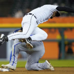 
              Detroit Tigers shortstop Javier Baez (28) tags Kansas City Royals' Kyle Isbel at second base in the eighth inning of a baseball game in Detroit, Wednesday, Sept. 28, 2022. (AP Photo/Paul Sancya)
            