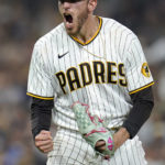 
              San Diego Padres starting pitcher Joe Musgrove reacts after getting the third out with the bases loaded during the fifth inning of the teams' baseball game against the Los Angeles Dodgers, Wednesday, Sept. 28, 2022, in San Diego. (AP Photo/Gregory Bull)
            