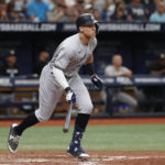 
              New York Yankees' Aaron Judge watches his double to right field against the Tampa Bay Rays during the seventh inning of a baseball game Sunday, Sept. 4, 2022, in St. Petersburg, Fla. (AP Photo/Scott Audette)
            