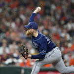 
              Tampa Bay Rays starting pitcher Drew Rasmussen throws against the Houston Astros during the first inning of a baseball game Friday, Sept. 30, 2022, in Houston. (AP Photo/David J. Phillip)
            