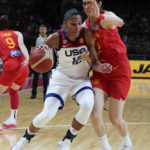 
              United States' Alyssa Thomas pushes past China's Pan Zhenqi, right, during their game at the women's Basketball World Cup in Sydney, Australia, Saturday, Sept. 24, 2022. (AP Photo/Mark Baker)
            