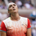 
              Ons Jabeur, of Tunisia, reacts after losing a point to Iga Swiatek, of Poland, during the women's singles final of the U.S. Open tennis championships, Saturday, Sept. 10, 2022, in New York. (AP Photo/Charles Krupa)
            