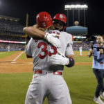 
              St. Louis Cardinals designated hitter Albert Pujols (5) celebrates with Brendan Donovan (33) after hitting a home run during the fourth inning of a baseball game against the Los Angeles Dodgers in Los Angeles, Friday, Sept. 23, 2022. Brendan Donovan and Tommy Edman also scored. It was Pujols' 700th career home run. (AP Photo/Ashley Landis)
            